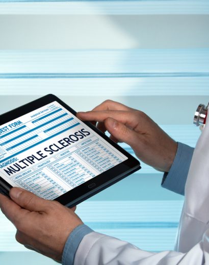 Doctor,Consulting,Medical,Record,On,The,Tablet,With,Text,Sclerosis
