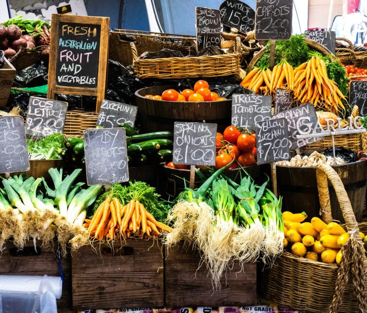 food,farmers market,fresh,healthy A table of fresh fruits and veggies for sale at a market