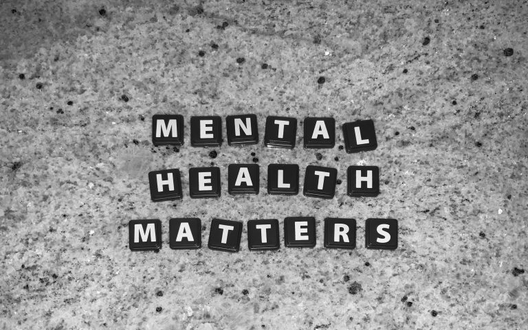Black Letter Tiles Spelling Out Mental Health Matters