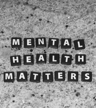 Black Letter Tiles Spelling Out Mental Health Matters